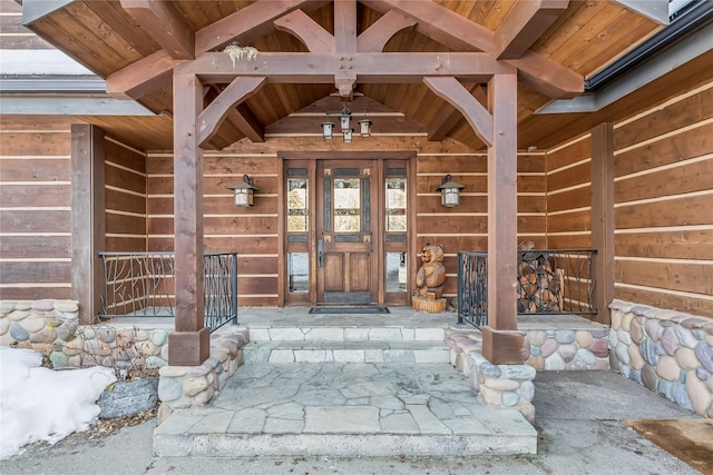 entrance to property with covered porch