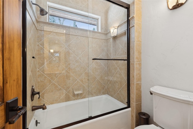 190 Black Bear Ln, Bigfork, MT 59911 - bathroom featuring enclosed tub / shower combo and toilet