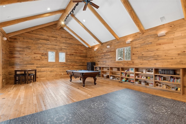 190 Black Bear Ln, Bigfork, MT 59911 - recreation room featuring pool table, wood walls, wood-type flooring, beam ceiling, and ceiling fan
