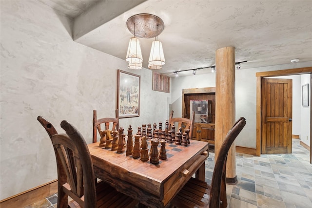 dining area with track lighting