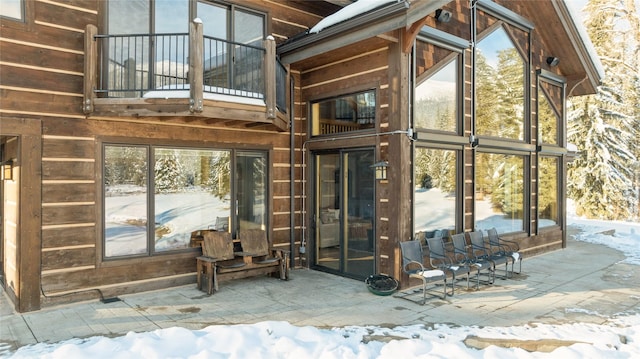 exterior space featuring a patio area and a balcony