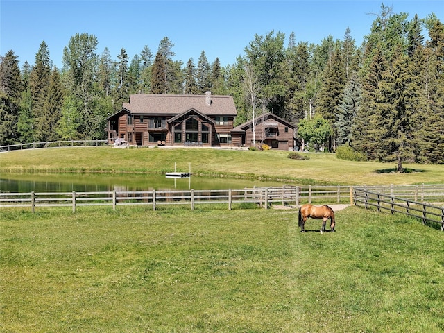 190 Black Bear Ln, Bigfork, MT 59911 - view of yard with a wooded view and a water view