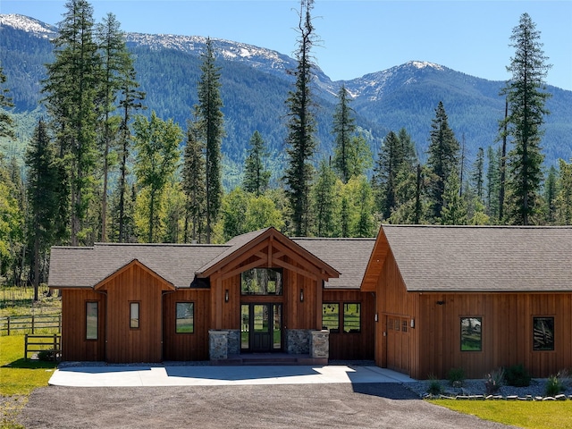 190 Black Bear Ln, Bigfork, MT 59911 - view of mountain backdrop with a heavily wooded area