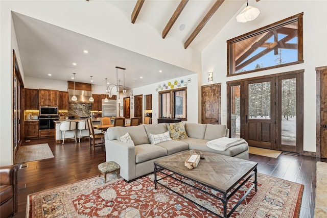 living room featuring dark wood-type flooring, beamed ceiling, and high vaulted ceiling