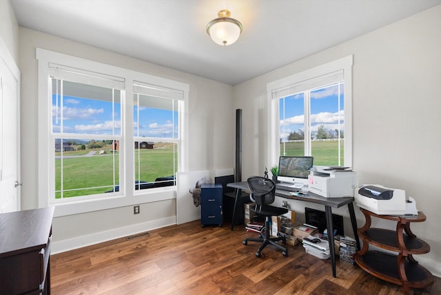 office area with dark hardwood / wood-style flooring