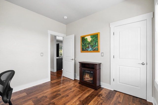 home office featuring dark hardwood / wood-style floors