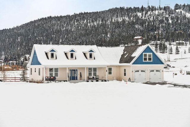 cape cod house featuring a mountain view