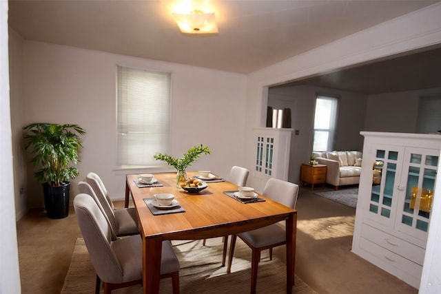 view of carpeted dining space