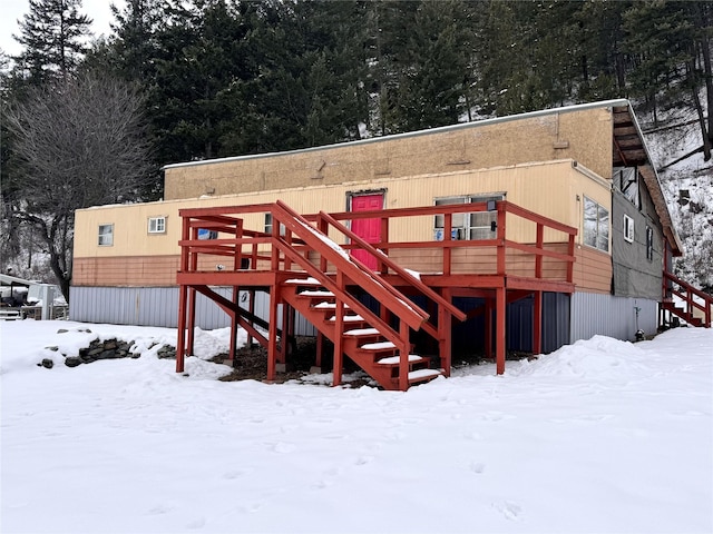 view of snow covered property