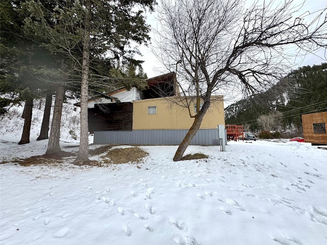 view of yard covered in snow