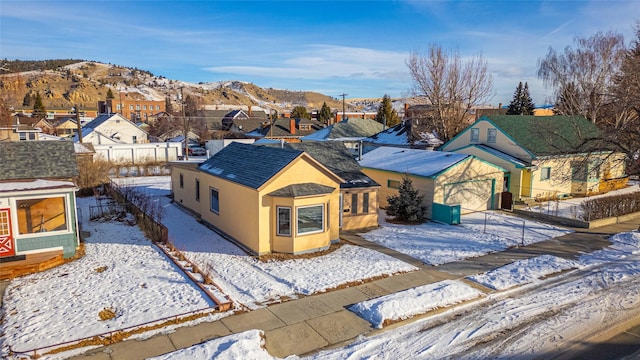 view of front of home featuring a mountain view