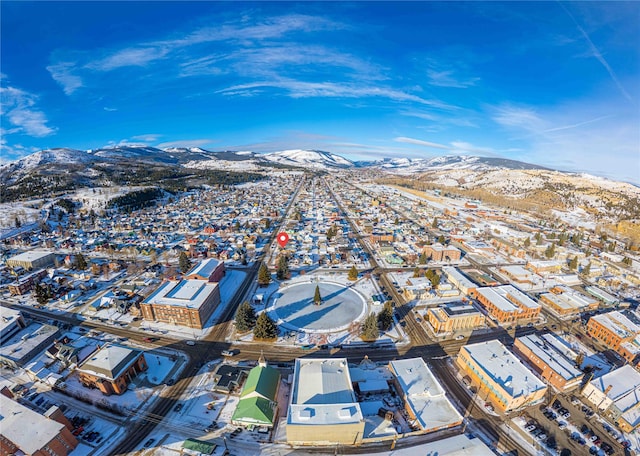 drone / aerial view featuring a mountain view