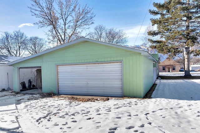 view of snow covered garage