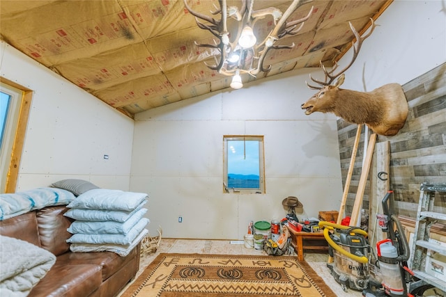 living room with wooden ceiling and vaulted ceiling