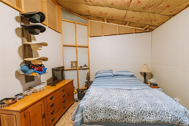 bedroom with vaulted ceiling