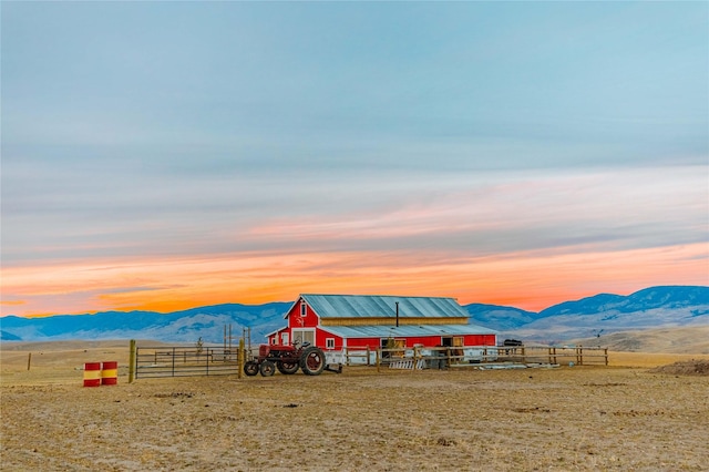 mountain view featuring a rural view