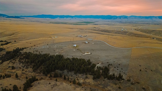 aerial view at dusk with a mountain view