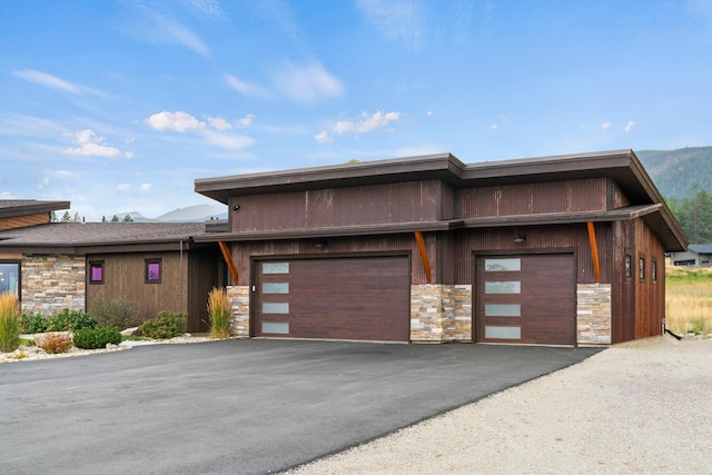 prairie-style home featuring a garage