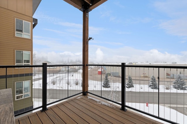 view of snow covered deck