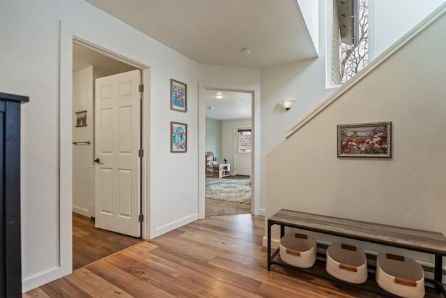 corridor featuring hardwood / wood-style flooring