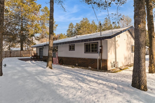 view of snow covered property