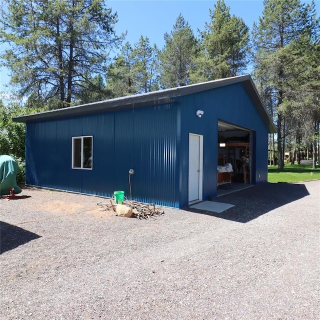 view of outbuilding with a garage