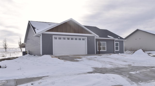 single story home featuring a garage