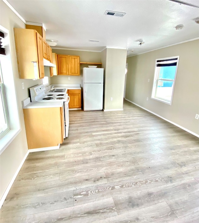 kitchen featuring white appliances, crown molding, and light wood-type flooring