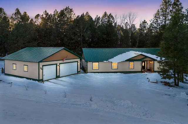 view of front of property with a garage