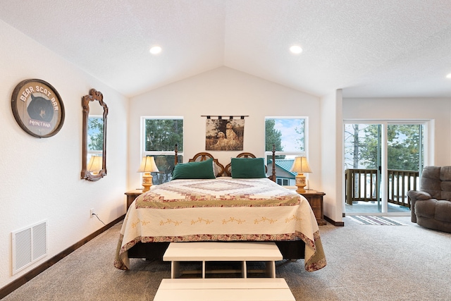 carpeted bedroom with lofted ceiling, access to exterior, and a textured ceiling