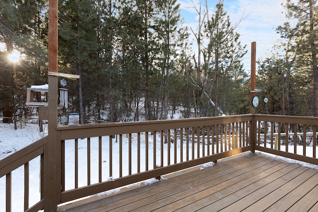 view of snow covered deck