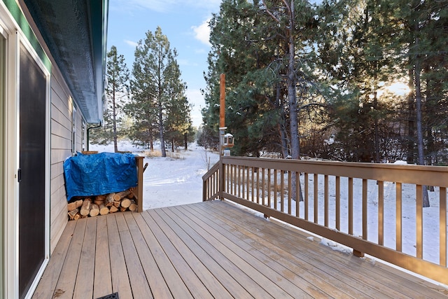 view of snow covered deck