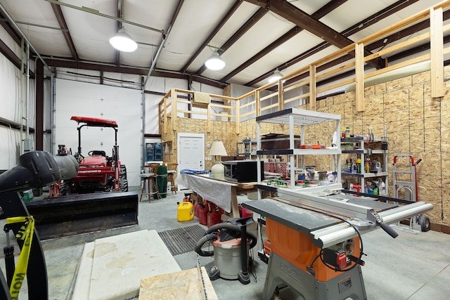 garage with a workshop area