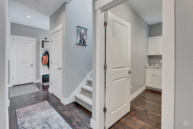 hallway featuring dark hardwood / wood-style floors