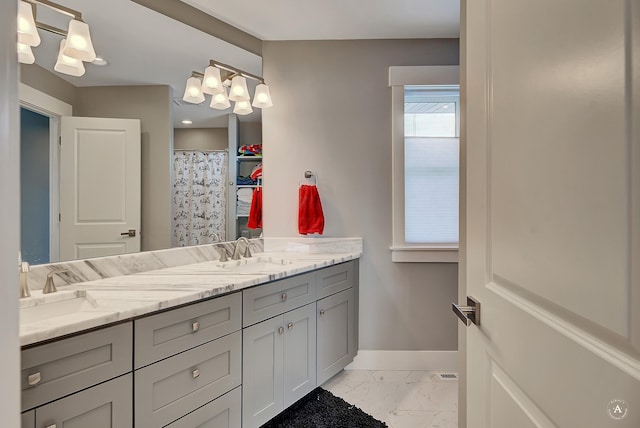 bathroom with vanity and a shower with shower curtain