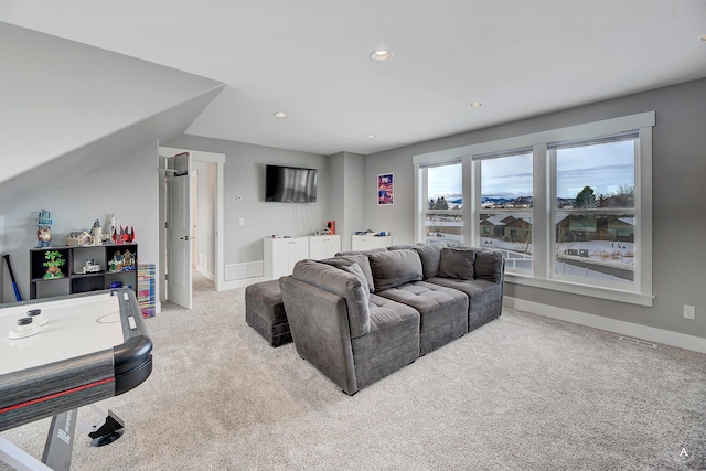 living room featuring light carpet