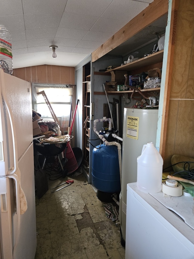 utility room featuring water heater