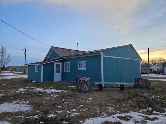 view of snow covered house