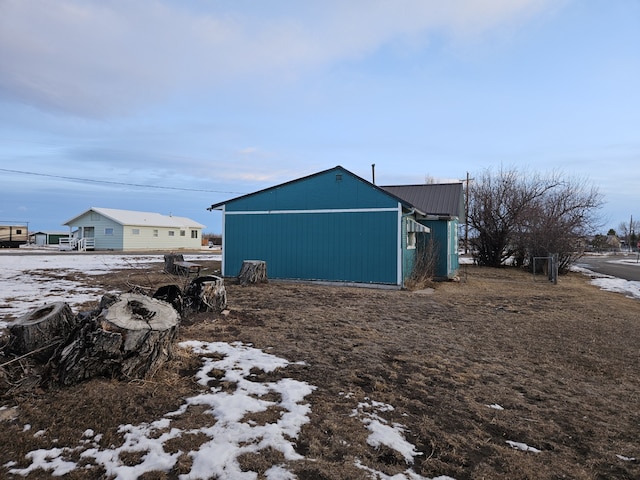 view of snow covered property