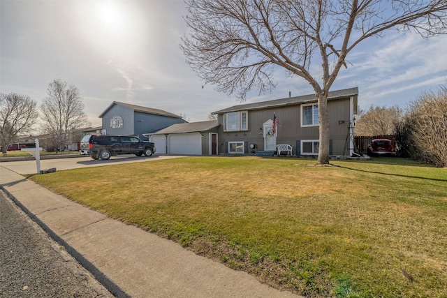 3761 Aster St, East Helena, MT 59635 - split foyer home featuring a front yard, entry steps, driveway, and a garage