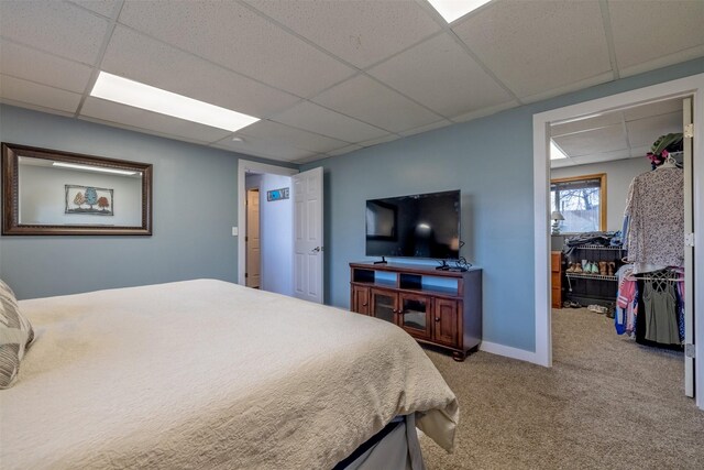 3761 Aster St, East Helena, MT 59635 - bedroom featuring carpet flooring, a paneled ceiling, and baseboards