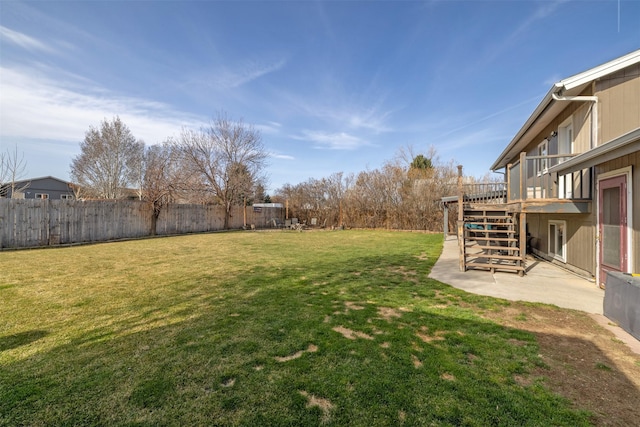 3761 Aster St, East Helena, MT 59635 - view of yard featuring a fenced backyard, stairway, a deck, and a patio