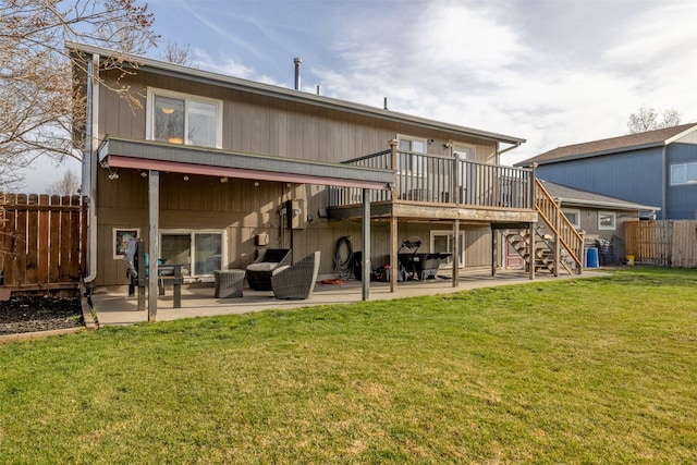 3761 Aster St, East Helena, MT 59635 - rear view of property with a wooden deck, a yard, stairway, a patio, and fence