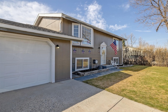 3761 Aster St, East Helena, MT 59635 - view of front of home with a garage, a front yard, and concrete driveway