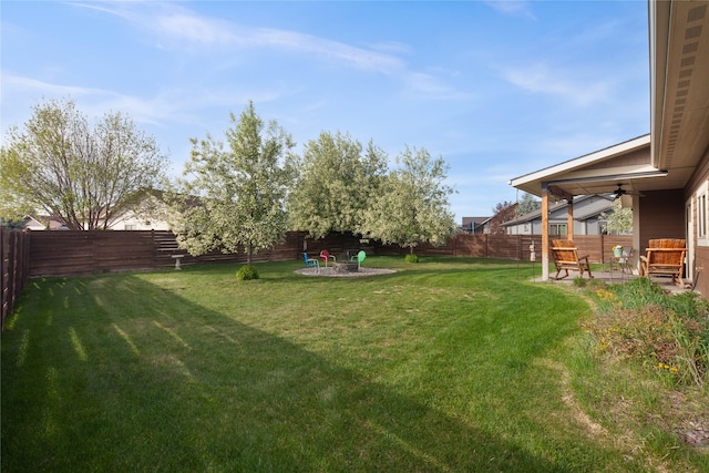 115 Stryker Peak Trl, Kalispell, MT 59901 - view of yard featuring a patio and a ceiling fan