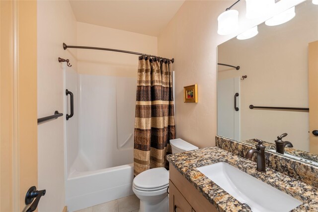 115 Stryker Peak Trl, Kalispell, MT 59901 - bathroom with toilet, vanity, shower / tub combo with curtain, and tile patterned floors