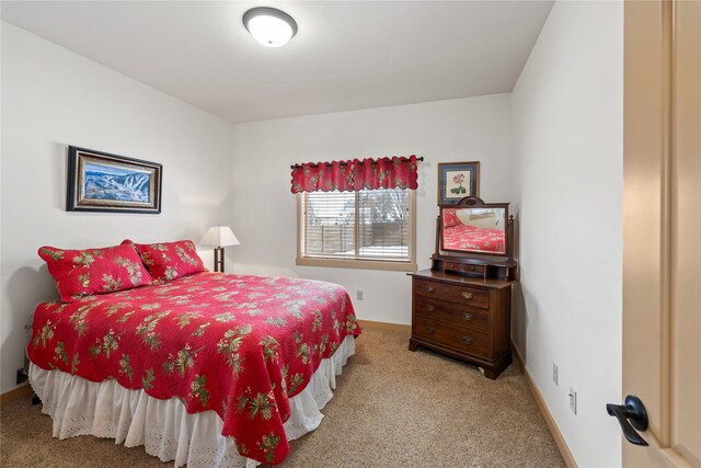 115 Stryker Peak Trl, Kalispell, MT 59901 - carpeted bedroom featuring baseboards