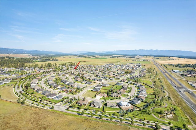 115 Stryker Peak Trl, Kalispell, MT 59901 - view of property location with a mountain backdrop and nearby suburban area