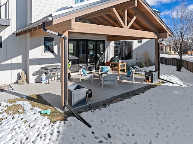 view of snow covered patio