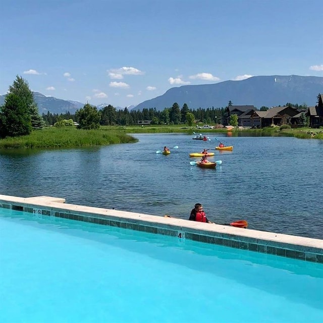 property view of water featuring a mountain view